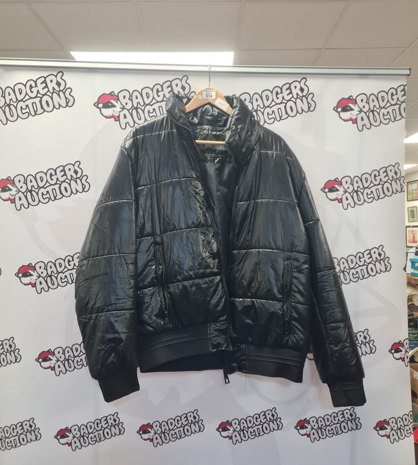 Black Zara puffer coat women's size XL for winter warmth.