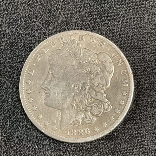1886 Morgan Silver Dollar obverse featuring Lady Liberty.