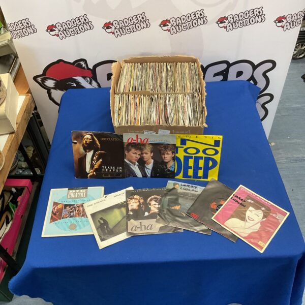 Collection of 1980s vinyl singles, showcasing vintage pop music.