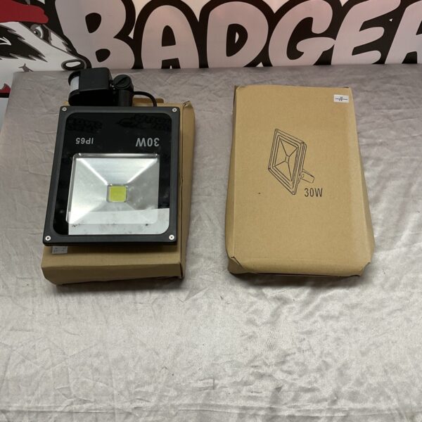 New 30W IP65 rated LED floodlight for outdoor garden lighting.