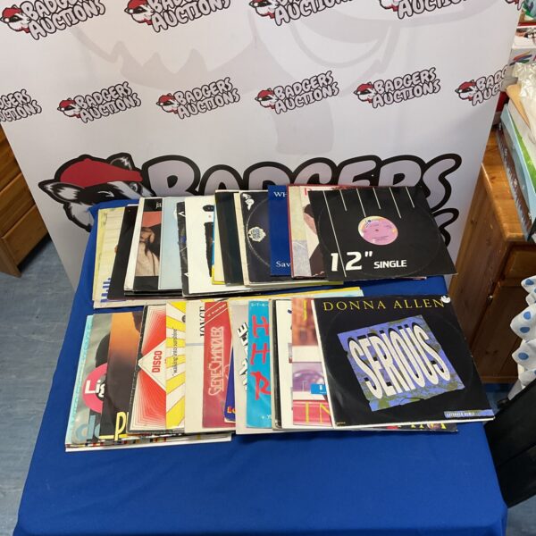 Lot of fifty 12 inch dance records for collectors.