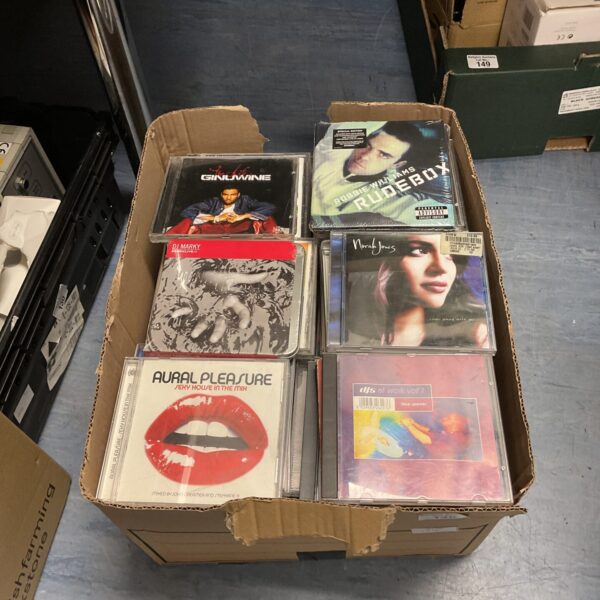 Box of 90s CDs including Pop, House and Soul music.