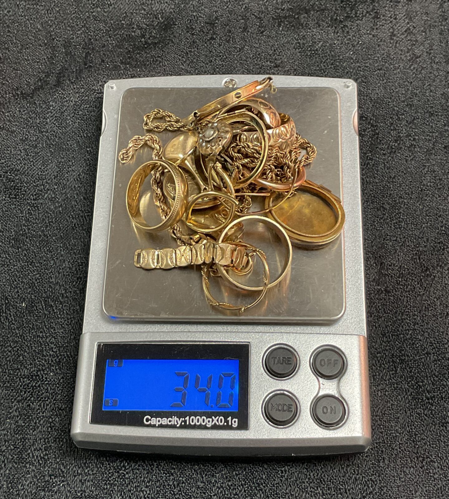 34 g of scrap 9ct gold – Badgers Auctions