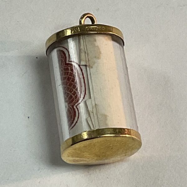 Vintage 9ct gold charm with ten shilling note inside.