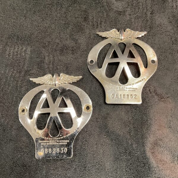 Vintage AA badges, enamel finish, collectible motoring memorabilia.