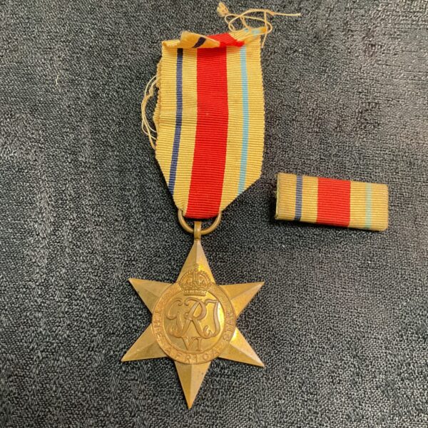 WWII Africa Star medal with ribbon bar, a collectible military item.