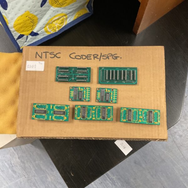 Close-up of an analog to digital converter board with chips.