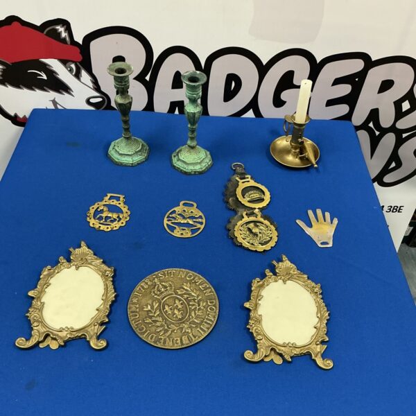 Antique brass candlesticks in a mixed lot, vintage home decor.