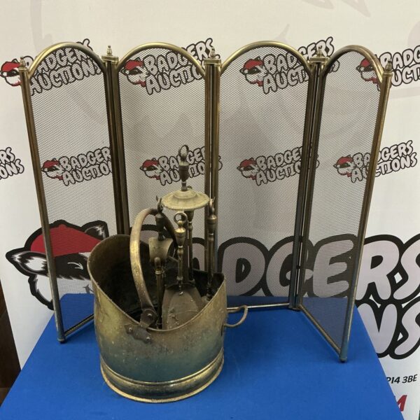 Antique brass fire guard set with coal scuttle and companion tools.