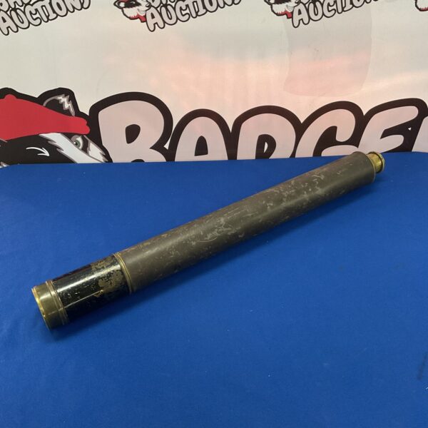 Antique brass two-draw telescope, vintage nautical instrument.