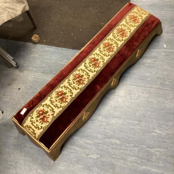 Antique church kneeling stool with red velvet and gold embroidery.