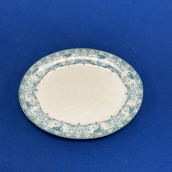 Antique Colonial Pottery Malvern plate with floral design.