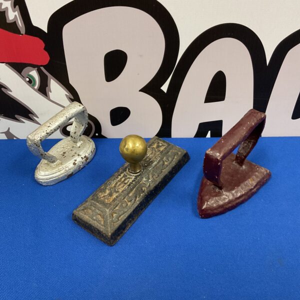 Antique cast iron flat irons, a vintage ironing collection.