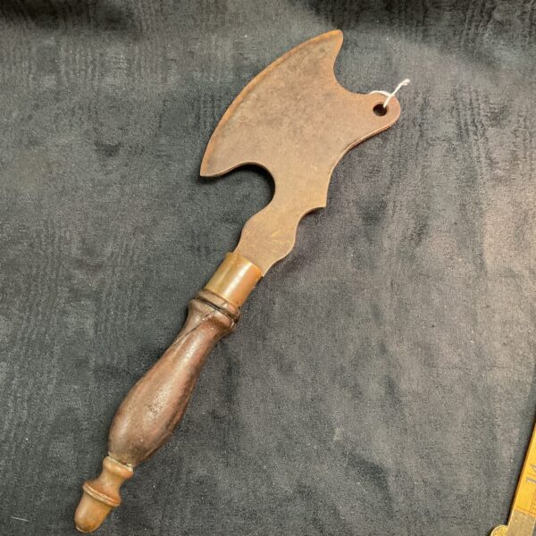 Antique French butcher’s cleaver with wooden handle.
