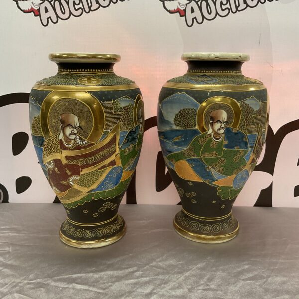 Pair of antique Japanese Satsuma moriage vases with detailed hand-painted scenes.