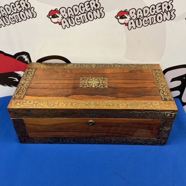 Antique mahogany writing slope with brass inlay, front view.