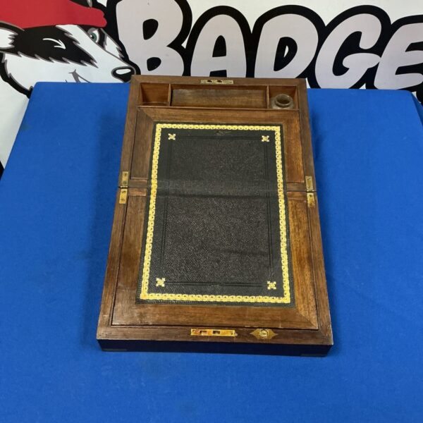 Antique mahogany writing slope with brass fittings, front view.