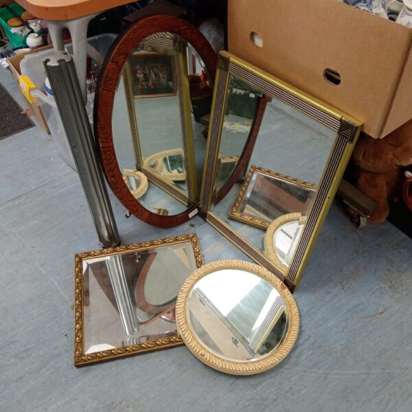 Lot of four antique mirrors with oak and gilt frames.