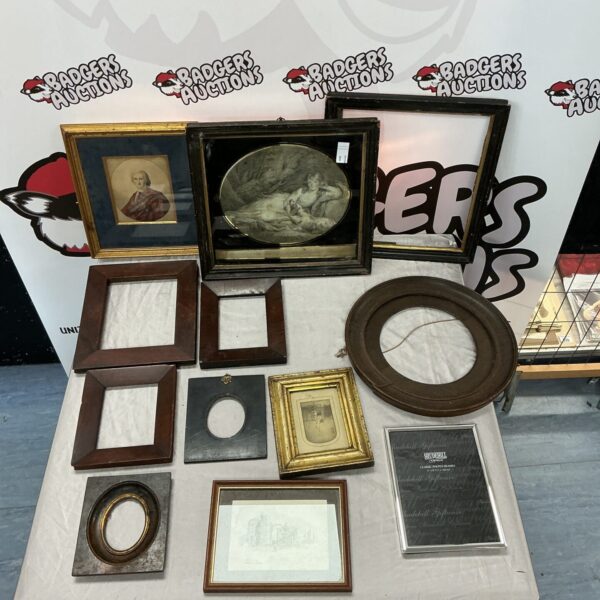 Lot of antique picture frames with ornate detailing and gilded finishes.