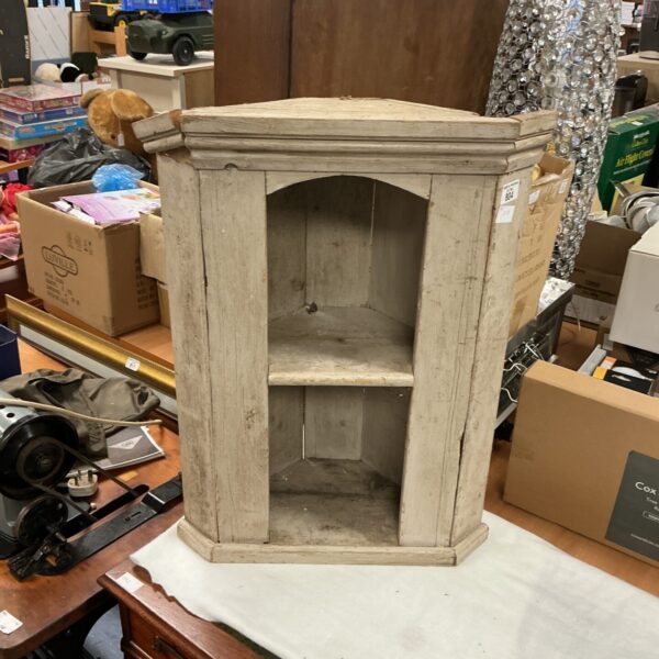 Antique pine corner shelf unit with tiered design.