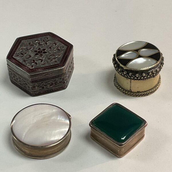 Intricate hexagonal antique silver pill pot.
