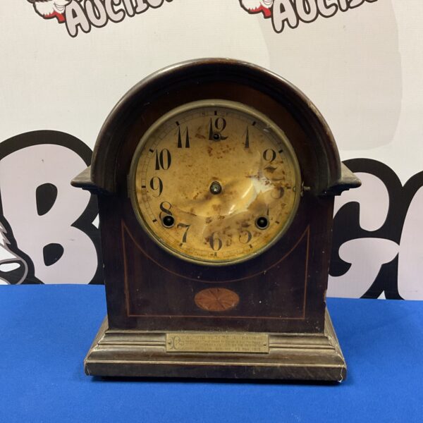 Antique Wm L Gilbert mantle clock with visible movement.