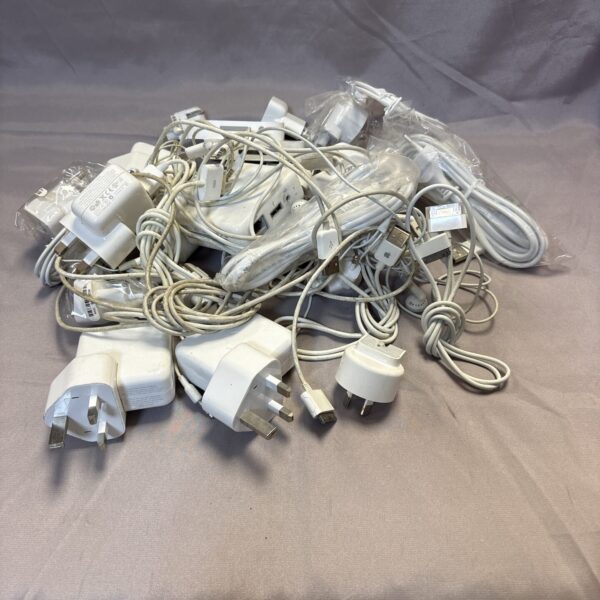 Apple charger lot with various adapters and cables.