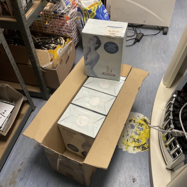 White Aqualisa Varispray shower heads in original packaging.