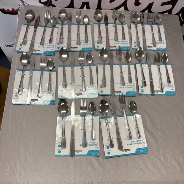 Ashley 4-piece stainless steel cutlery set in packaging.