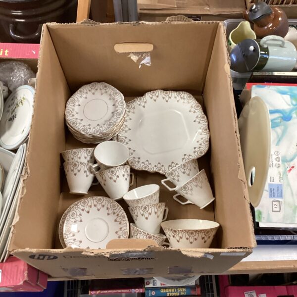 Assorted vintage china tea cups and saucers in a mixed lot.