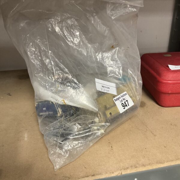 Assorted vintage hinge sets in a plastic bag.