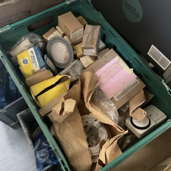 Assorted lamps and collectibles lot with vintage lighting options.