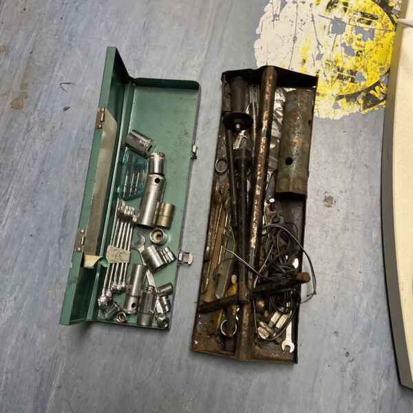 Assorted vintage tools in two trays, a mechanic's collection.