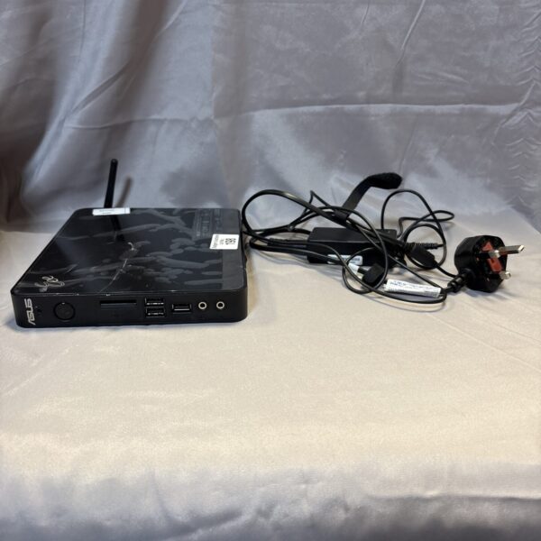 Black Asus Eeebox PC with power cable attached.