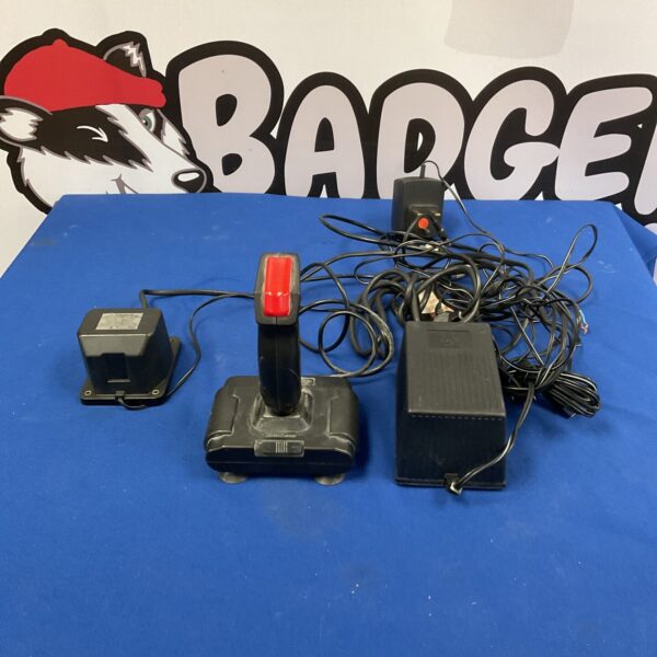 Vintage Atari Spectravideo joystick model 318-102 with mains adapter.