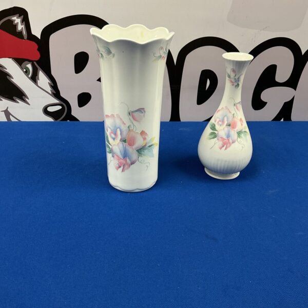 Vintage Aynsley sweetheart vases with delicate floral design.