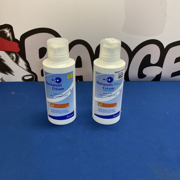 Two bottles of Balneum Plus Cream for skincare and moisturizing.
