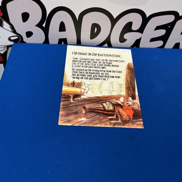 Vintage bar room plaque with taxidermy mouse enjoying a drink.