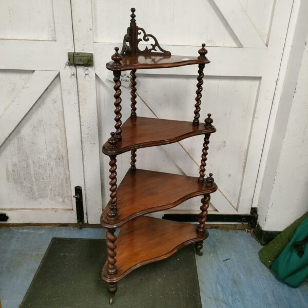 Vintage barley twist corner shelving unit with four tiers.