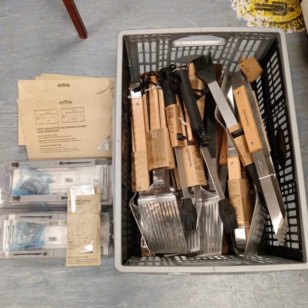 Lot of new BBQ tool sets and heat reflective sheets for grilling.
