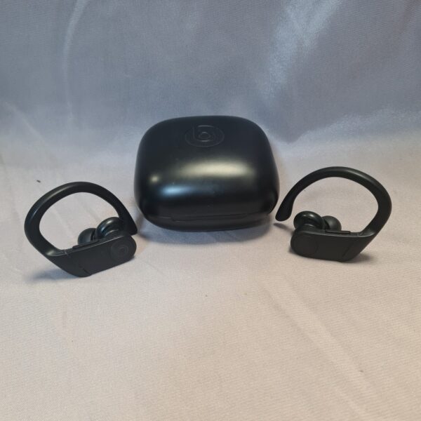 Black Beats Powerbeats Pro wireless headphones with charging case.