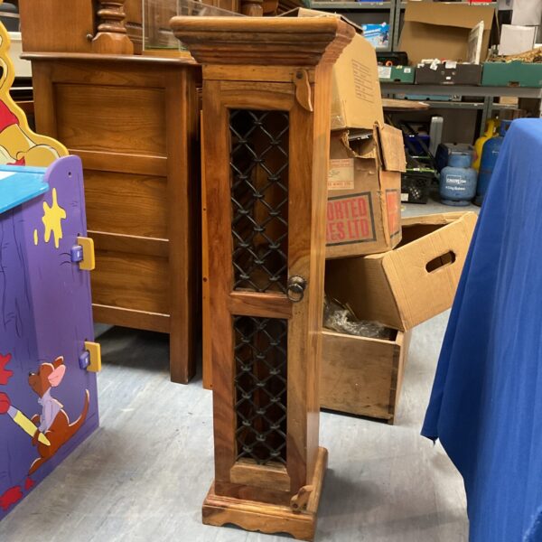 Antique Bengal wooden storage cabinet with carved details.