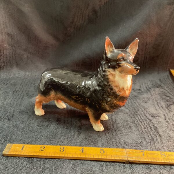 Vintage Beswick Corgi dog figurine, detailed porcelain sculpture.