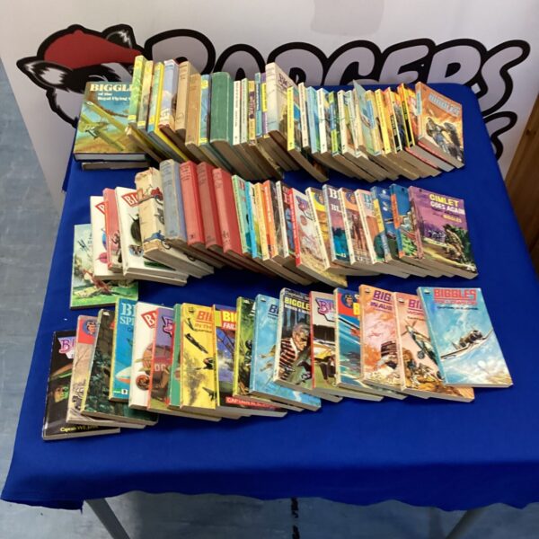 Large lot of vintage Biggles books for collectors and adventure fans.