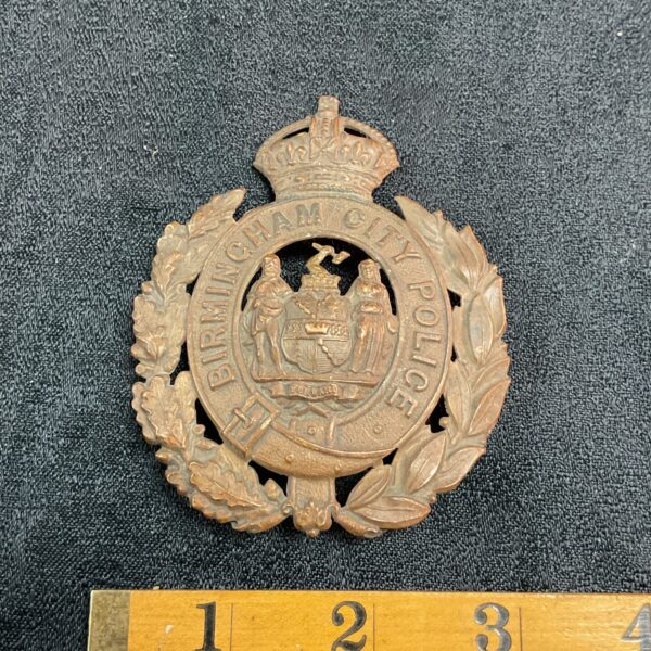 Vintage Birmingham City Police helmet plate badge, detailed brass crest.