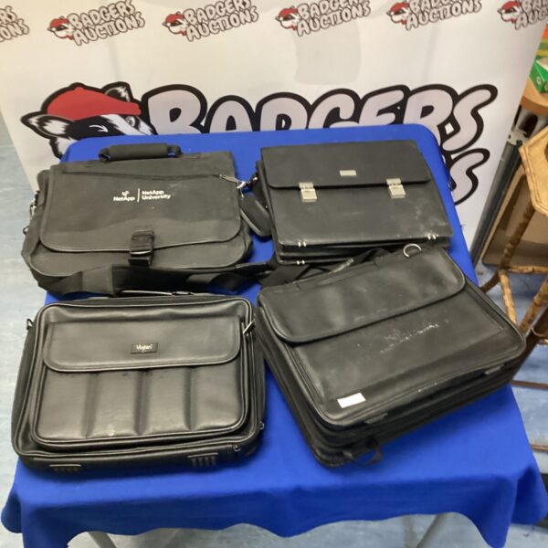 Black laptop bag lot including Viglen and NetApp brands.