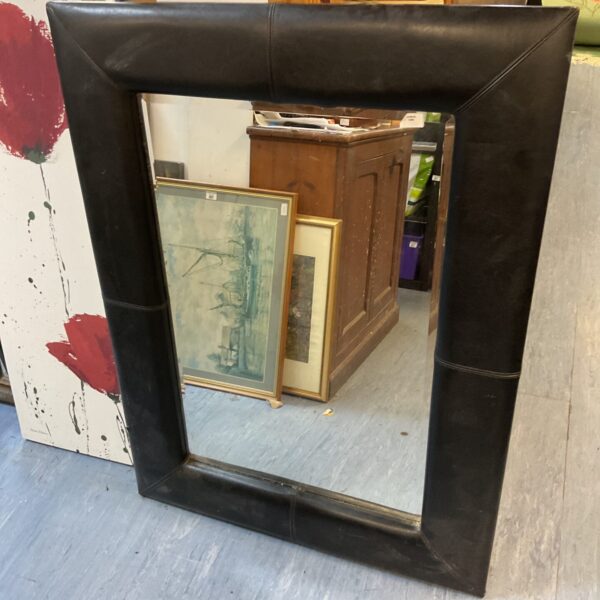Large black leather framed square mirror for wall decoration.