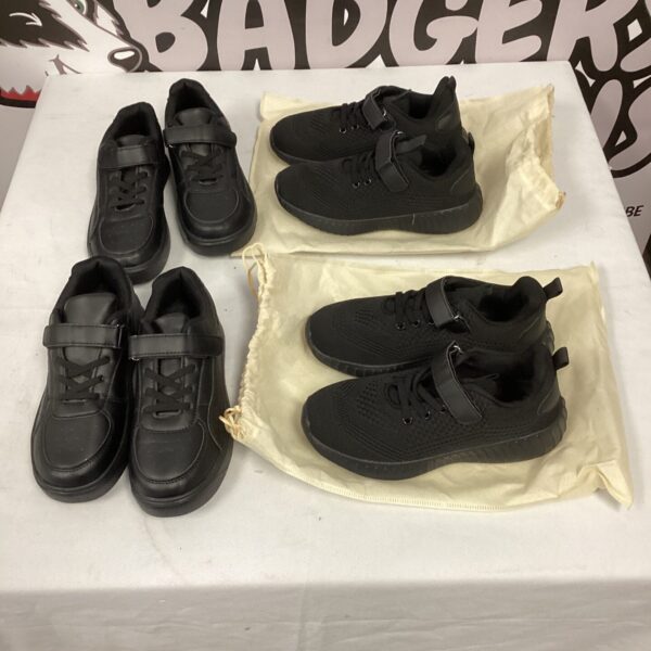 Lot of four new black trainers size 36.