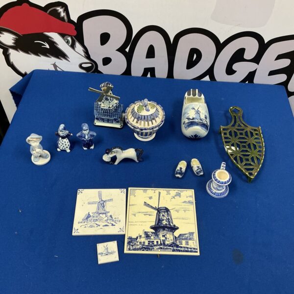 Antique blue and white porcelain collection with windmill details.