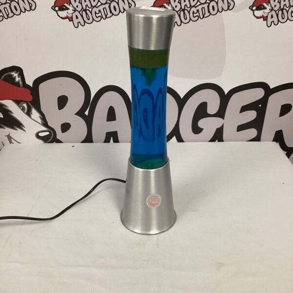 Vintage blue lava lamp with silver base, retro 1960s lighting.